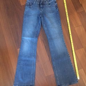 Light wash denim jeans. Silver jeans